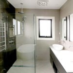 Frameless glass shower screen in a Canberra bathroom