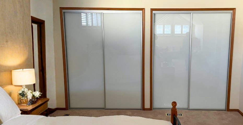 Sliding wardrobe door bottom track and roller repaired in a Canberra home